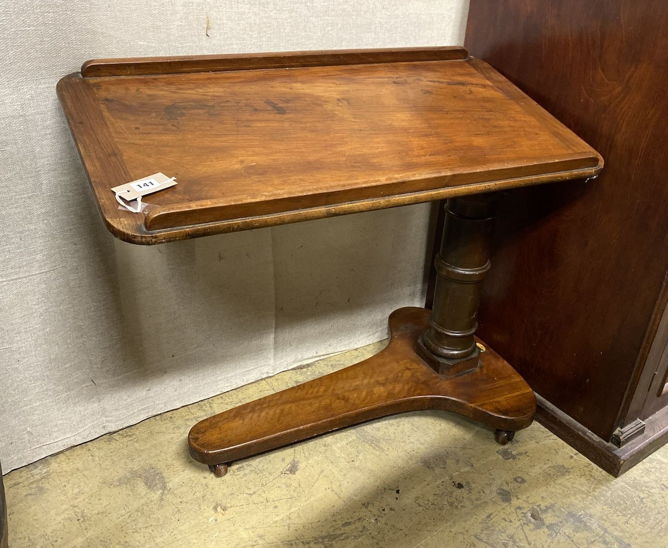 A Victorian Carter's Patent mahogany adjustable reading table, width 80cm
